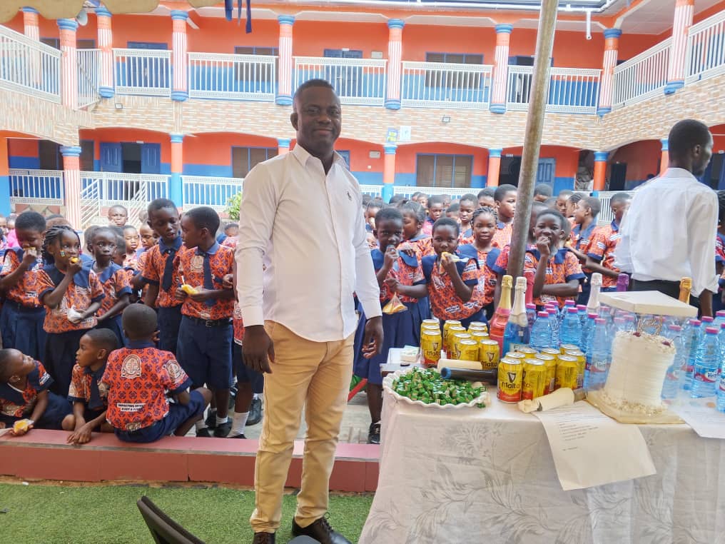 The school proprietor with students