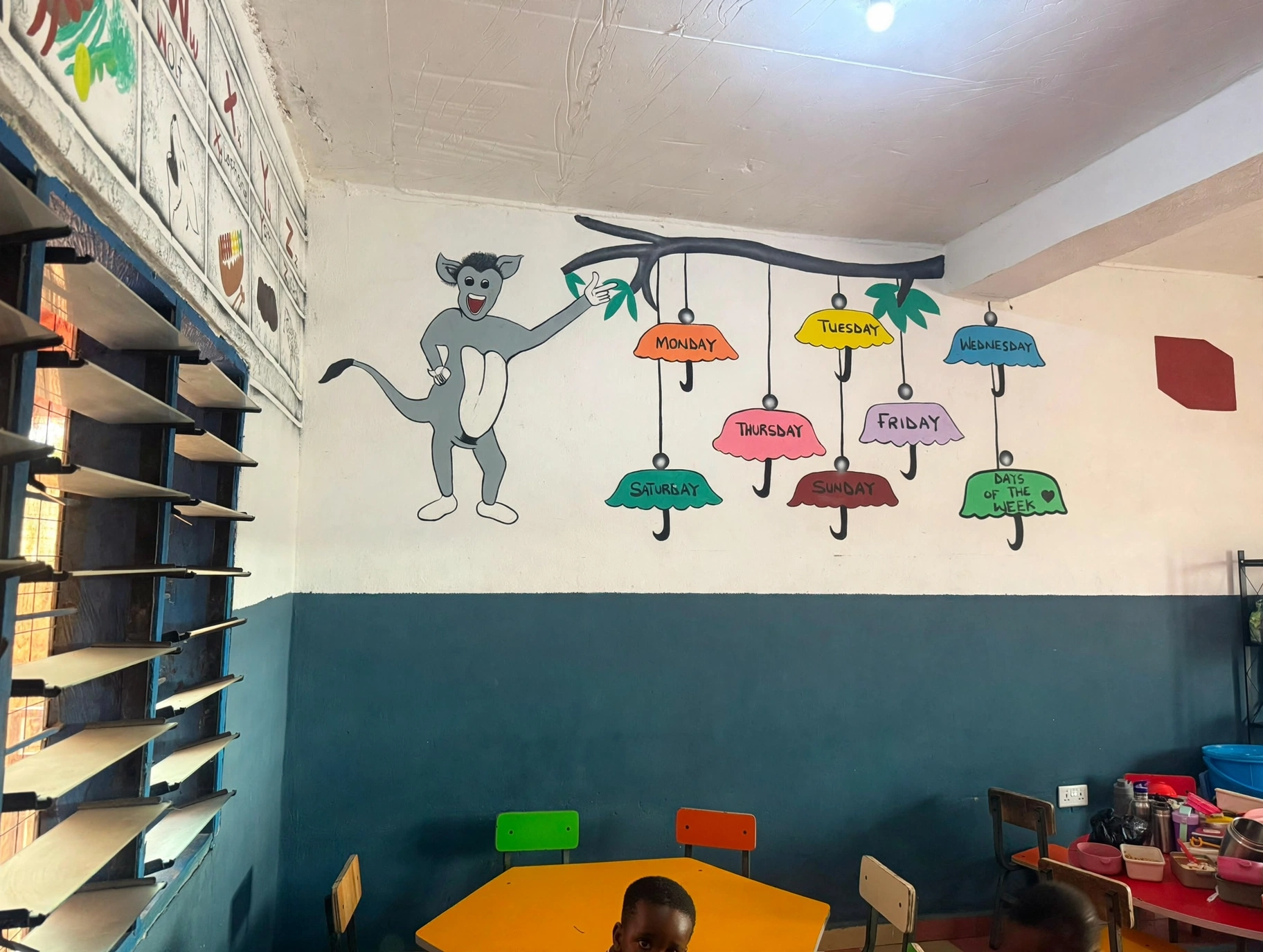 Colourful wall art brightens the early-learning room