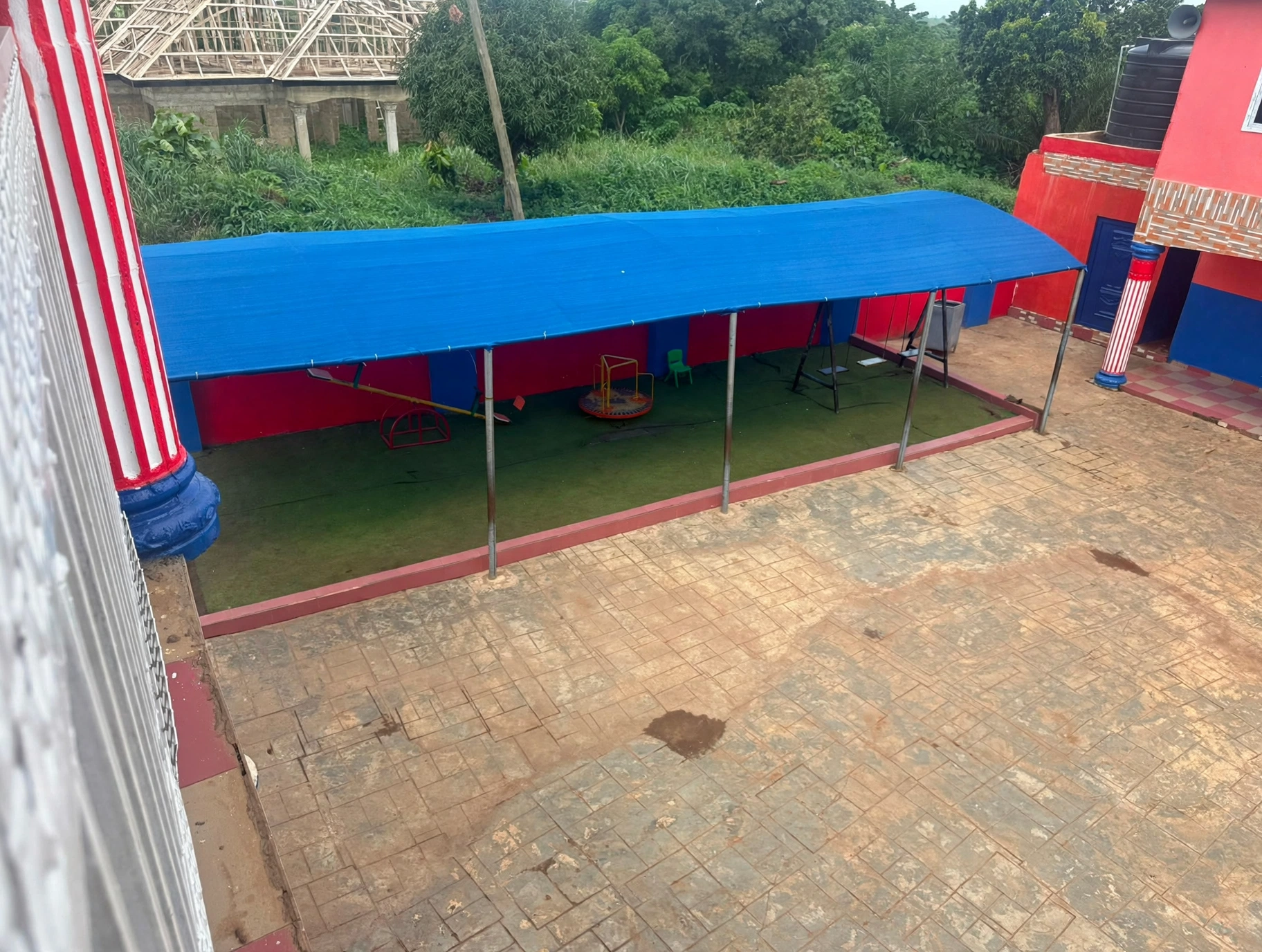 A shaded play area in the school grounds