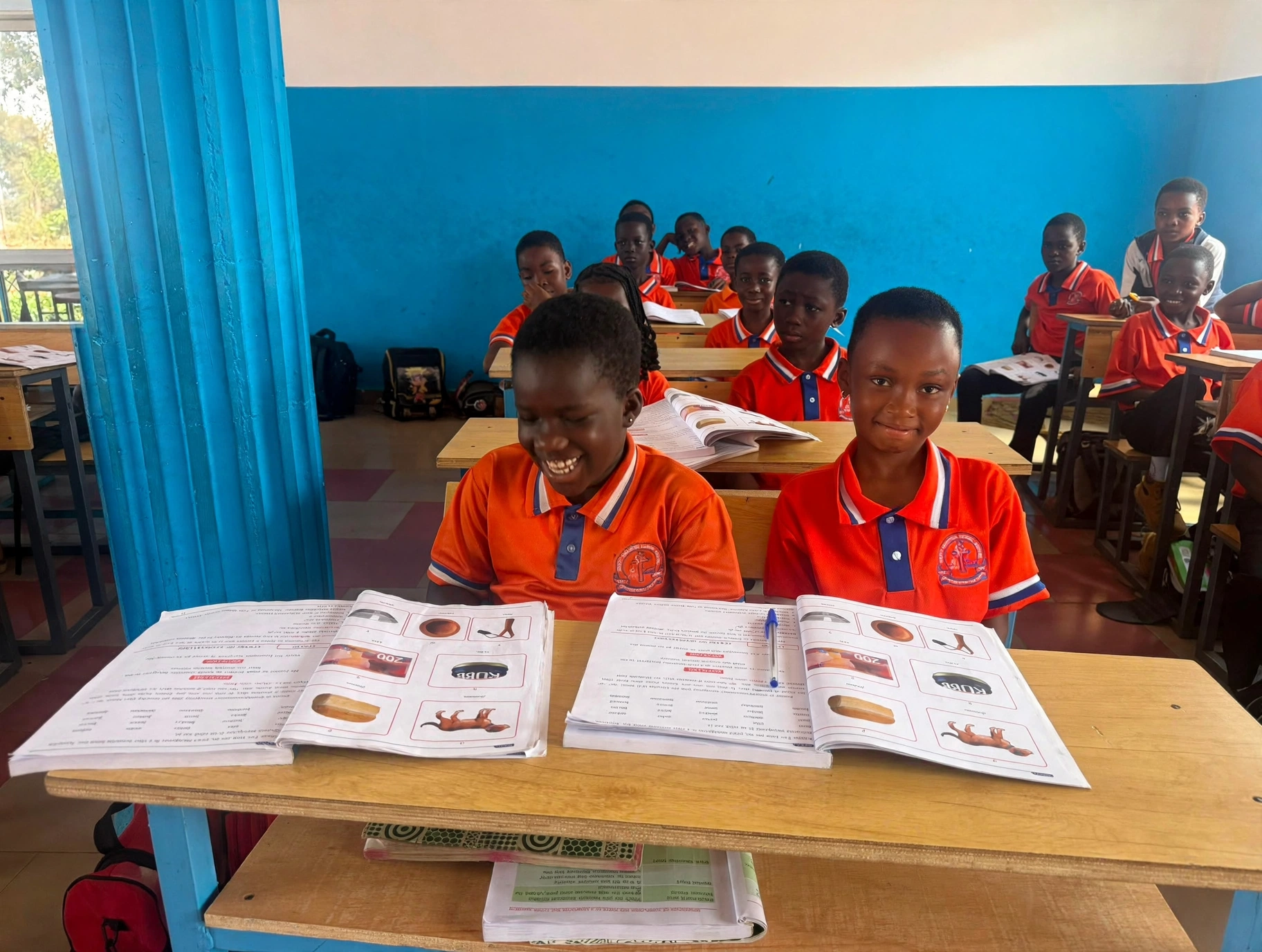 Pupils learning together around the table